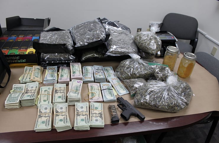 Drugs, cash and a firearm discovered during Piqua search warrant