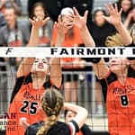 Versailles Lady Tigers advance to Elite 8 Taylor Wagner (25) and Kirsten Bomholt (8) team up for a Versailles block in the Lady Tigers win over Cardington-Lincoln. (Gaylen Blosser photo)