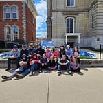 4-H Banner Bound Club plants pinwheels for Child Abuse and Neglect Awareness Month