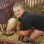 Sophia Hart and her Goat