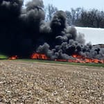 Smoke fills the air in Versailles as tires, farming material burns