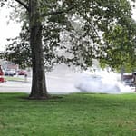 GFD puts out car fire in front of library