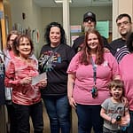 UAW sells buttons to help raiser funds, cancer awareness