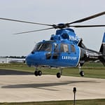 Driver rolls vehicle, airlifted to hospital