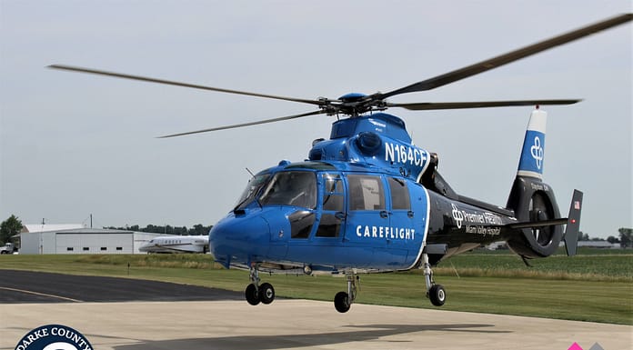 Driver rolls vehicle, airlifted to hospital