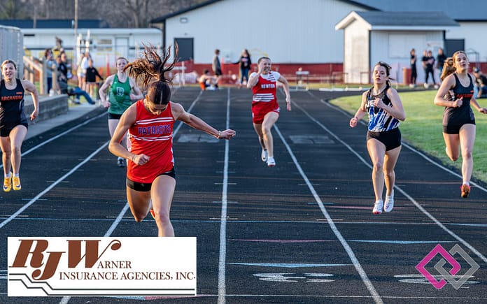 Five teams race to the finish line (L-R)Arcanum, Bethel, Tri-Village, Newton, Franklin Monroe, and Arcanum at host team, Arcanum Trojans. (Jim Freeman photo)