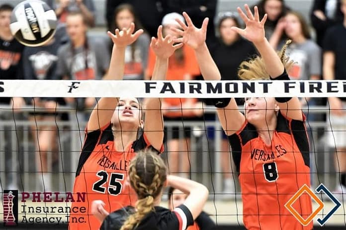 Taylor Wagner & Kirsten Bomholt Taylor Wagner (25) and Kirsten Bomholt (8) team up for a Versailles block in the Lady Tigers win over Cardington-Lincoln. (Gaylen Blosser photo)