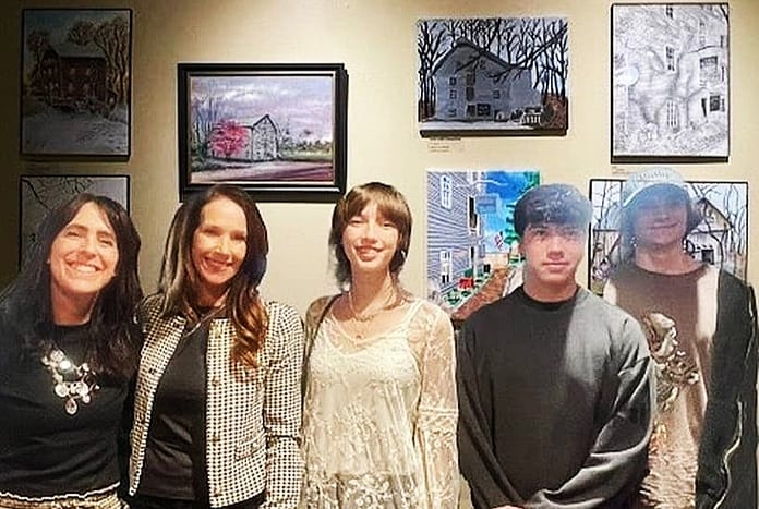 Hawk, Husted, Pope, Baker, Elson with artwork on display